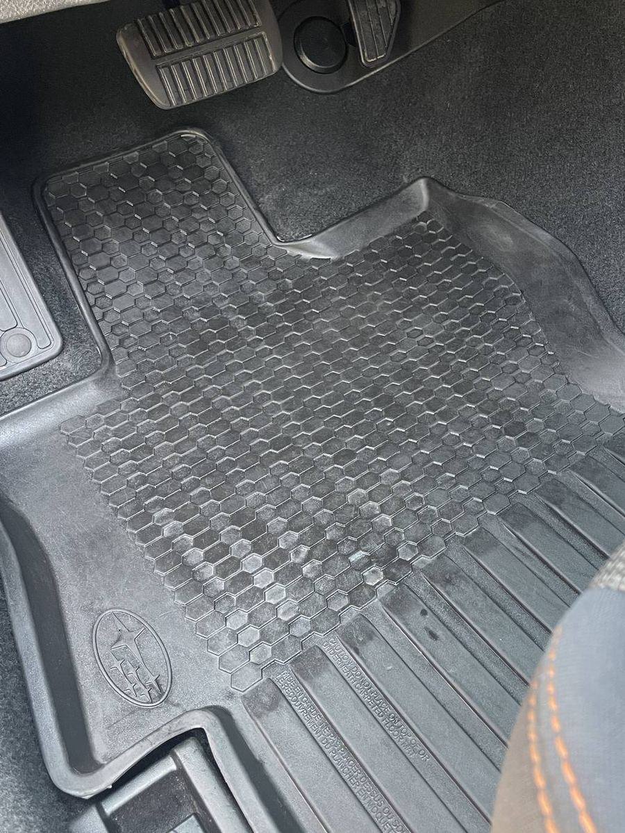 Subaru Crosstrek driver floor mat after detailing — clean rubber with the honeycomb texture visible again