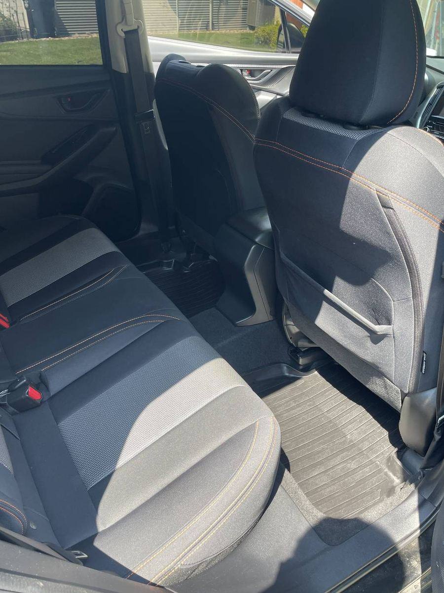 Subaru Crosstrek rear seats after detailing — clean upholstery and seat backs
